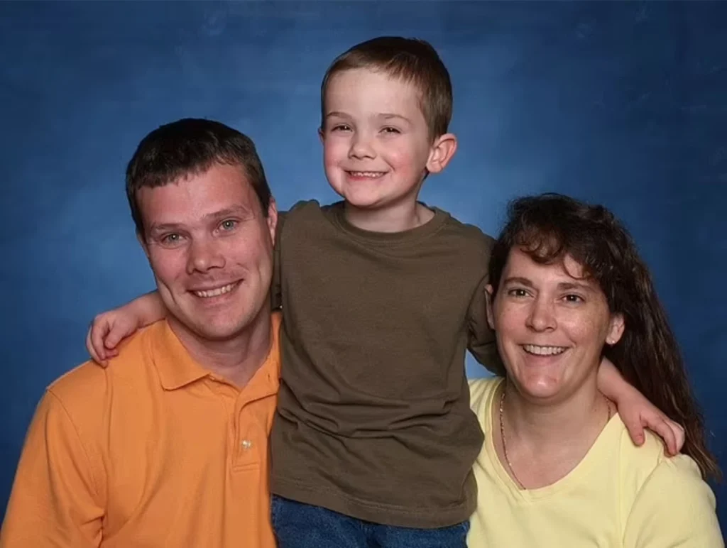 Timmothy Pitzen pictured with his parents, Jim Pitzen and Amy Fry-Pitzen
