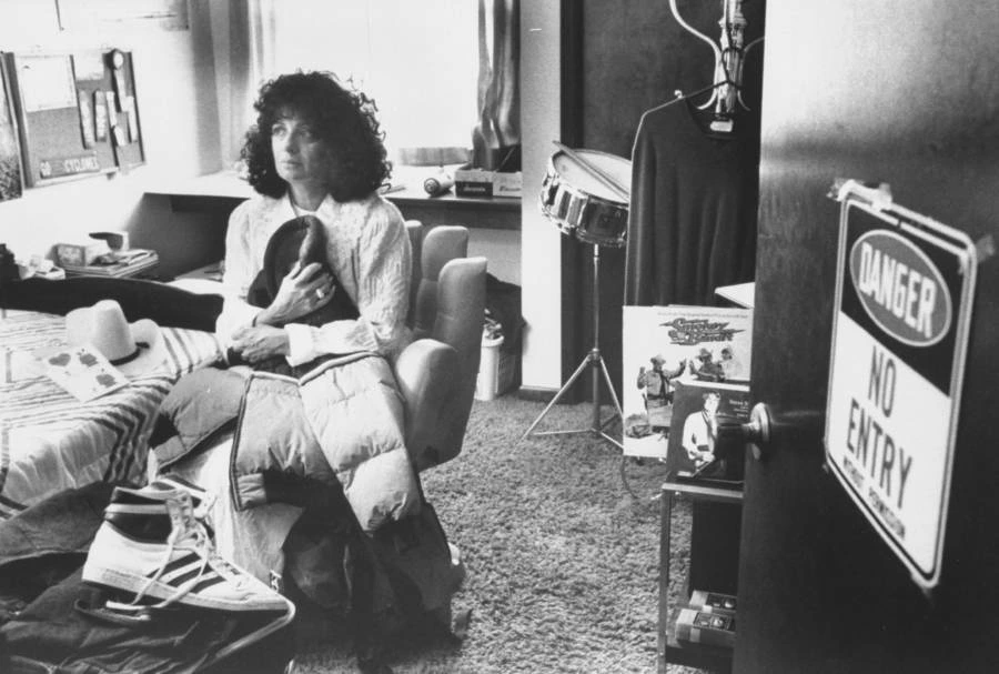 Noreen Gosch sits in her son Johnny’s room clutching his ski jacket