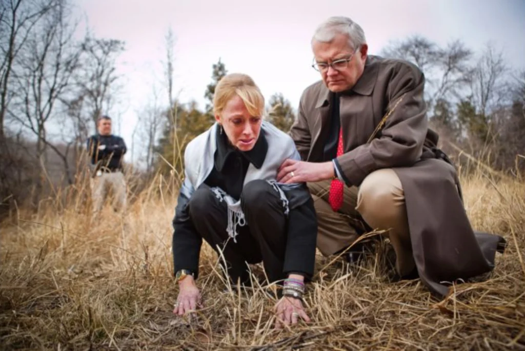 Jill Harrington, with her husband Dan, visits the site where their daughter Morgan’s remains were found in January 2011.
